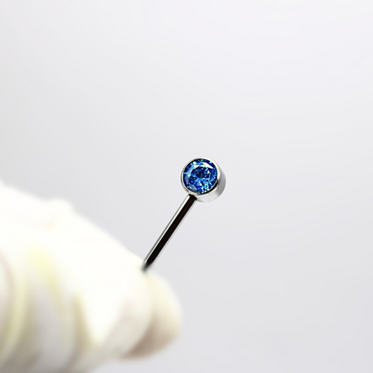 Barbell Titanio para Pezón  diseño 2 pastillas de zirconias azules