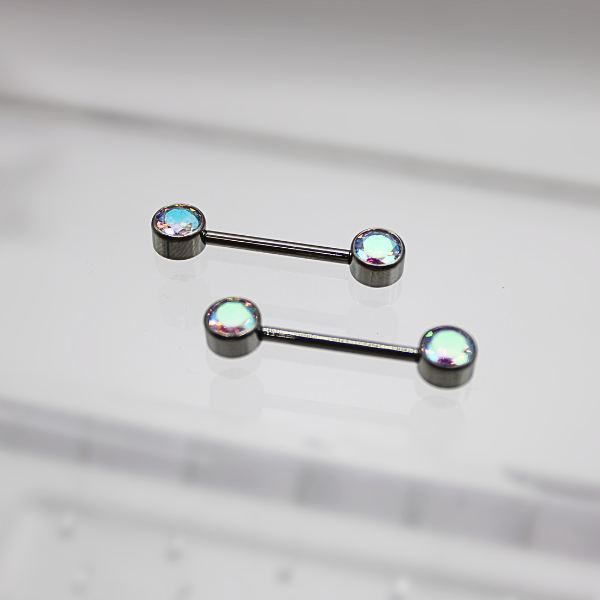 Barbell Titanio para Pezón diseño 2 pastillas de zirconias tornasol