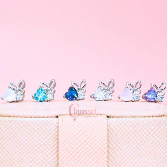 Broquel corazón mariposa plateado  - acero quirúrgico