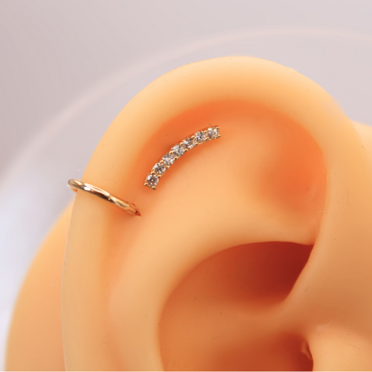 Labret Arco con Zirconias- Oro solido 14k