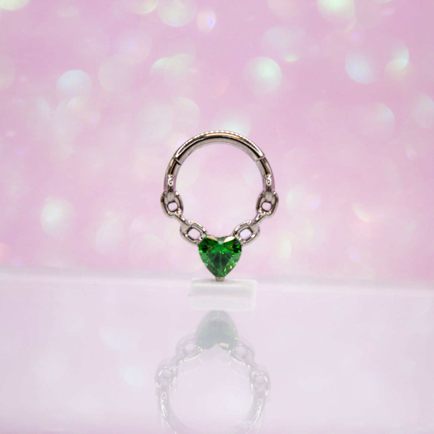 Aro clicker con zirconia verde - Titanio