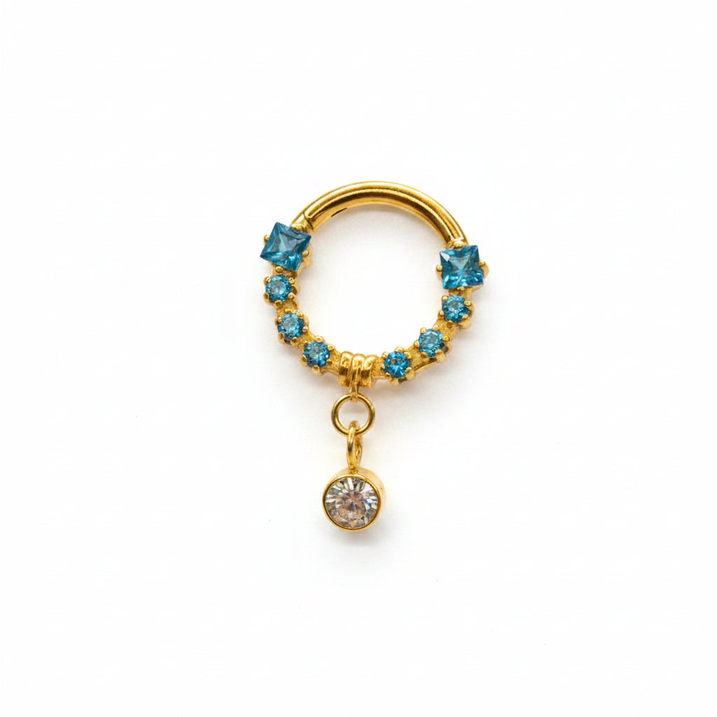 Piercing Aro clicker con zirconias azules y colgante -Titanio