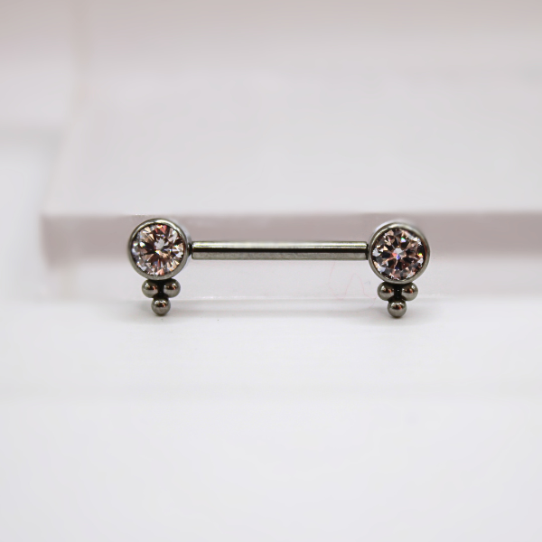 Barbell Titanio para Pezón maxi diseño zirconia blanca con 3 mini esferas