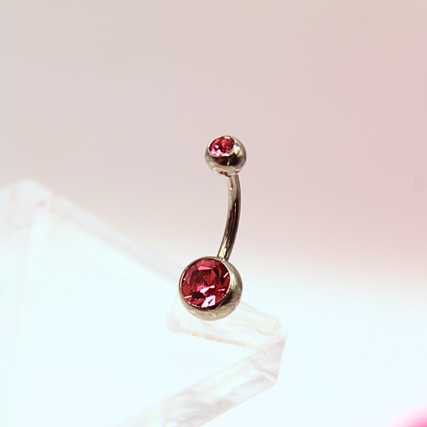 Barbell Curvo Titanio para Ombligo diseño con zirconia rosa