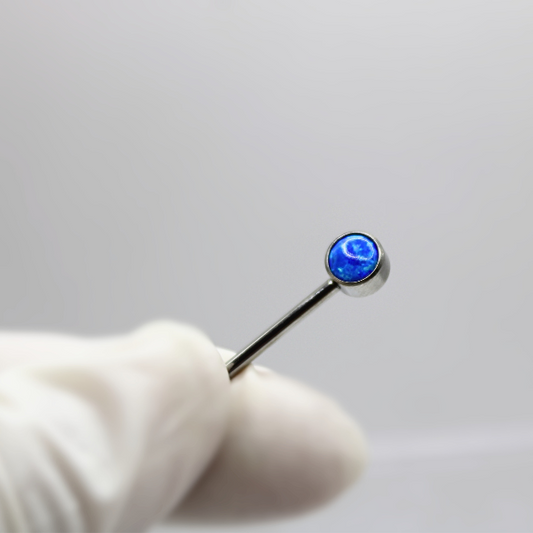 Barbell Titanio para Pezón  diseño 2 pastillas de opalos azules