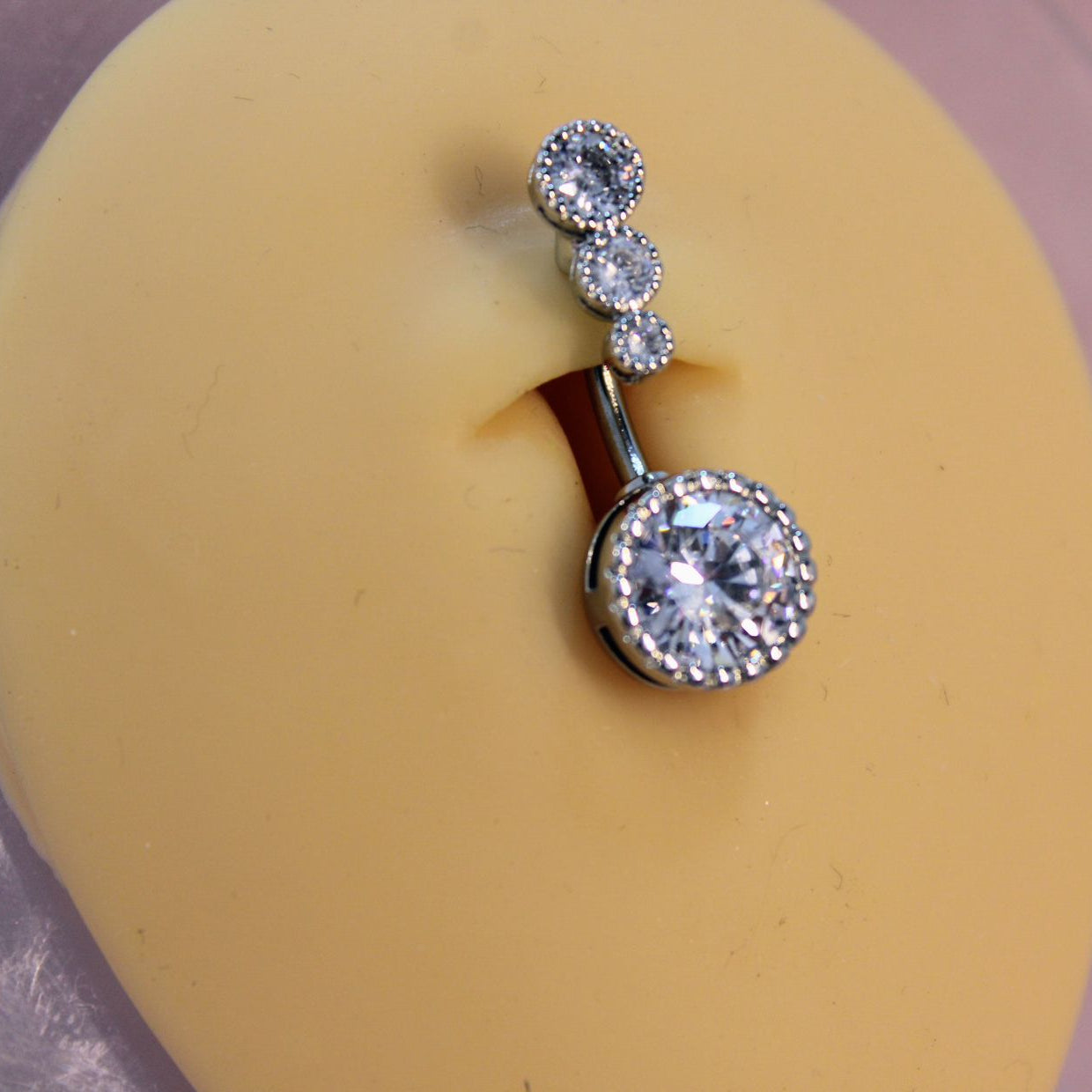 Piercing Ombligo 4 Zirconias Plata- Acero Quirúrgico