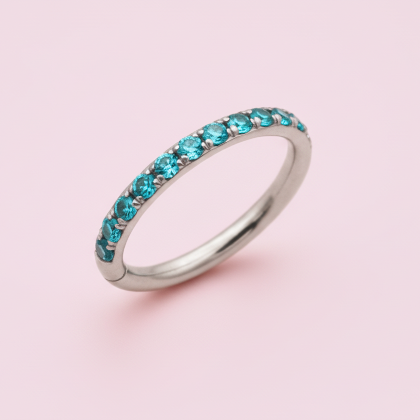 Piercing Aro Clicker con Zirconias Aqua -  Titanio