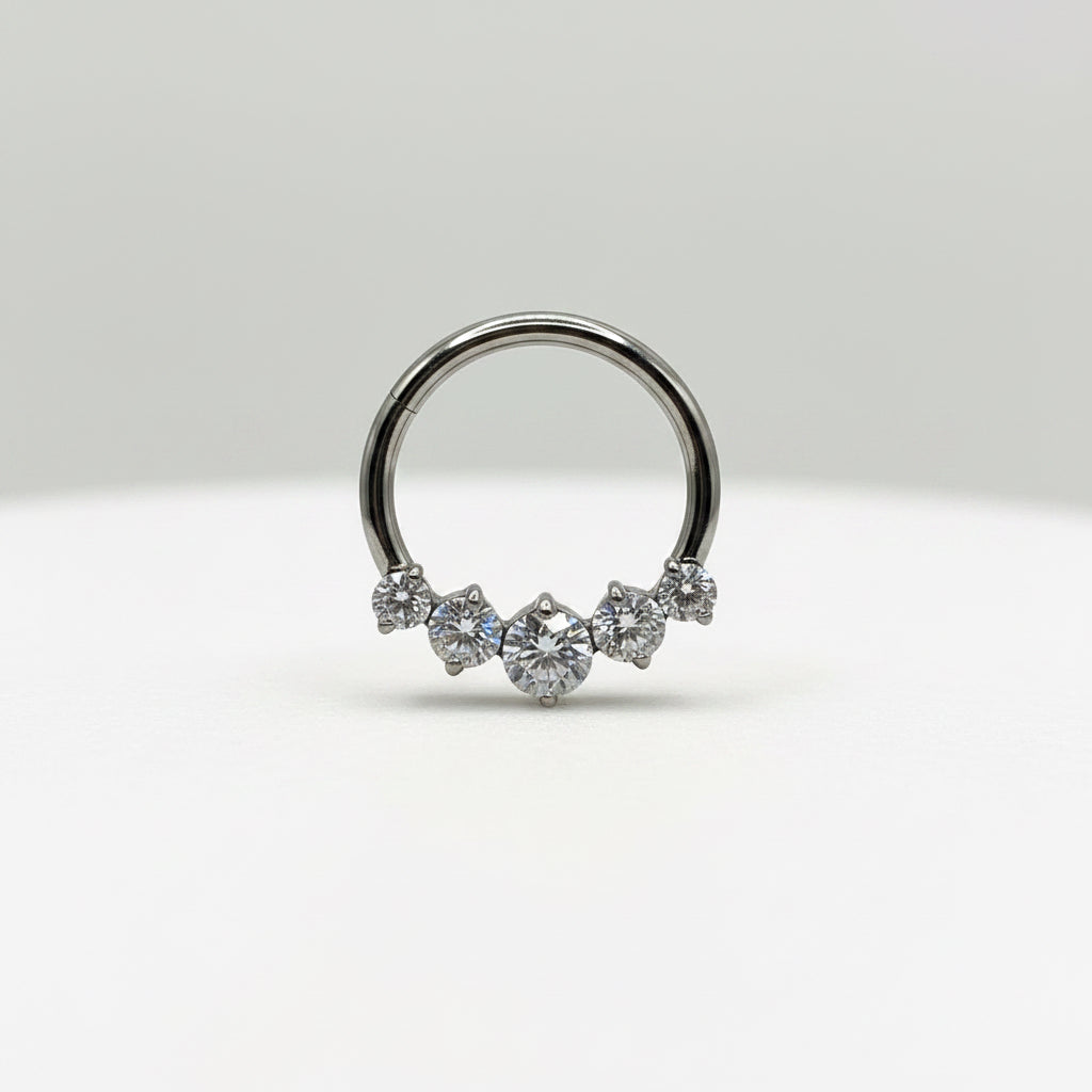 Piercing Aro clicker maxi diseño fila de zirconias - Titanio