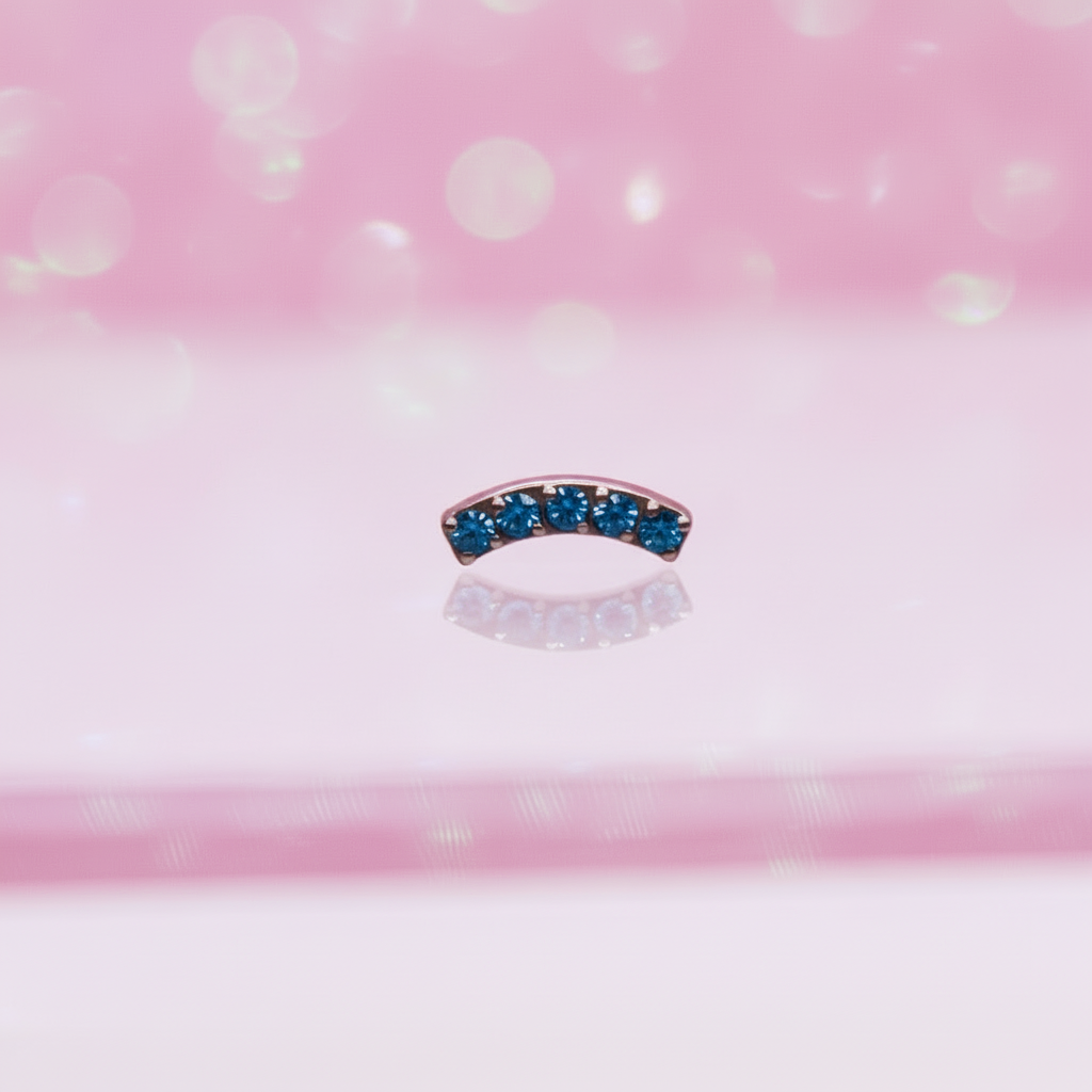 Piercing Arco con zirconias azules - Titanio