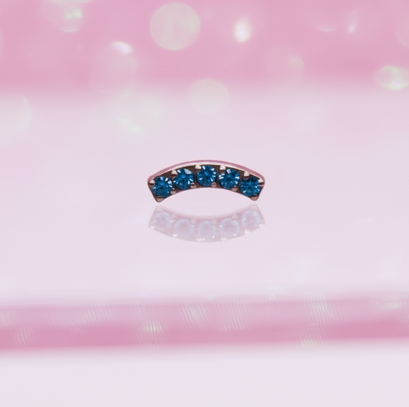Piercing Arco con zirconias azules - Titanio