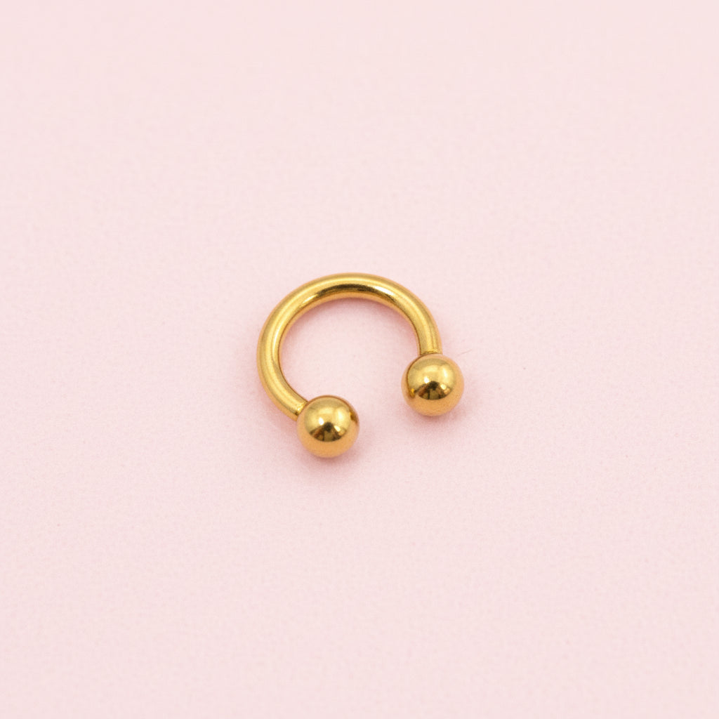 Piercing herradura dorado 6mm - Titanio