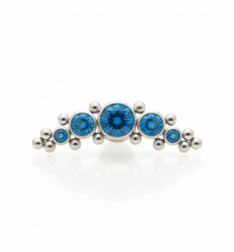 Piercing 5 pastillas y 14 microesferas zirconias azules- Titanio (Labret)