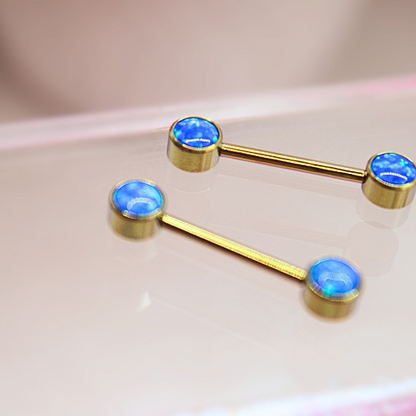 Barbell Titanio para Pezón  diseño 2 pastillas de opalos azules